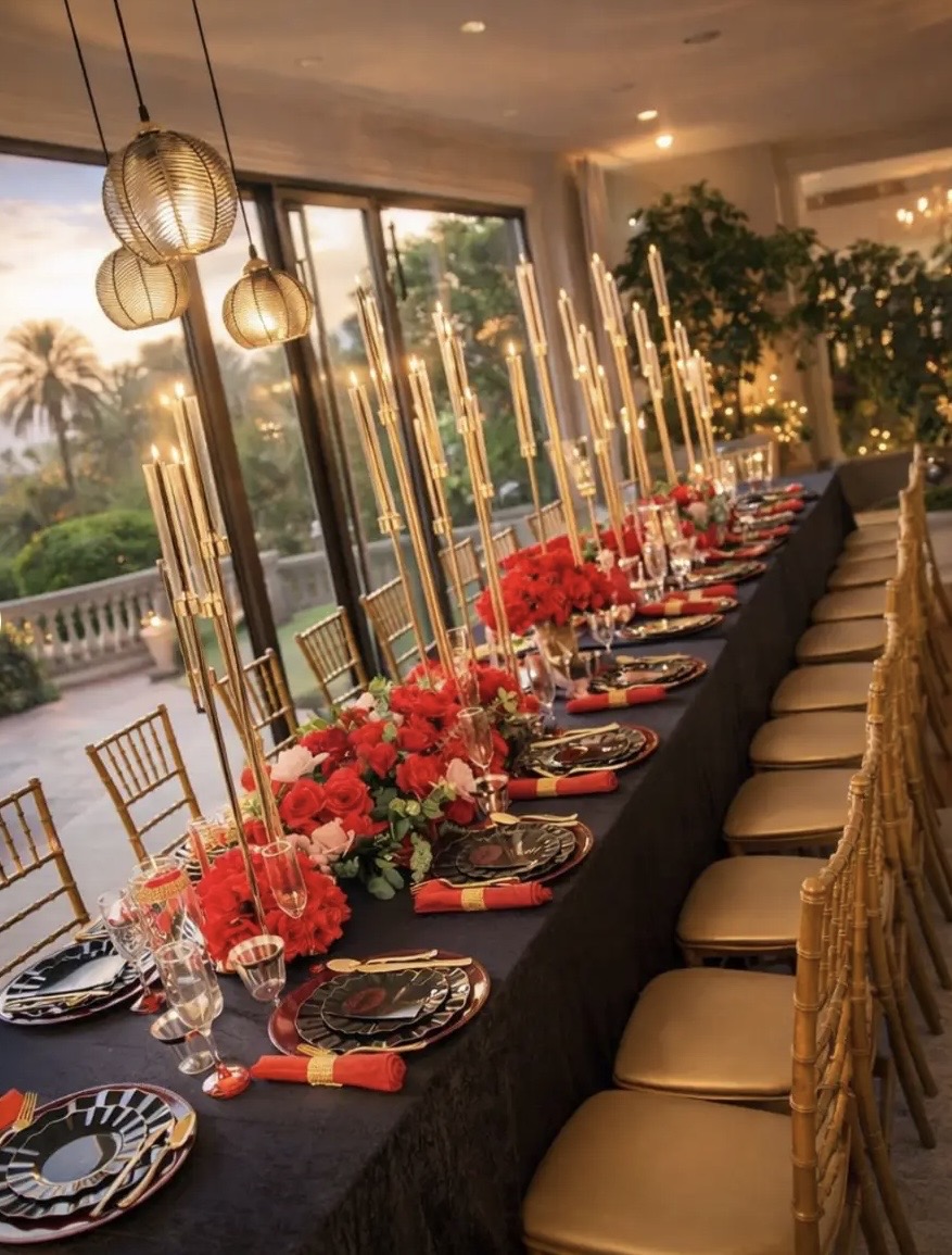 Red, black and gold balloon arch with leopard print Happy Birthday backdrop