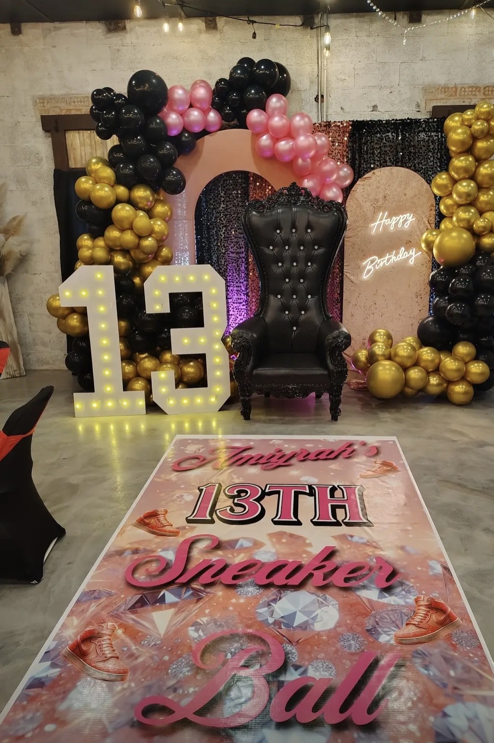 Black, purple and gold banquet styling with elegant table settings